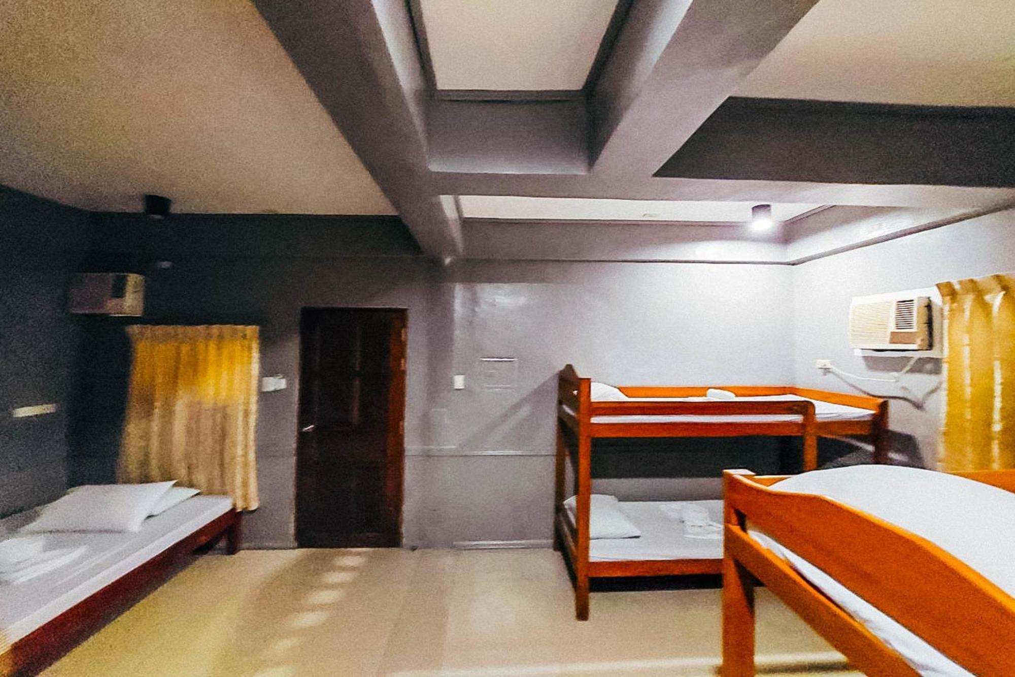 Mbg Travellers Inn Powered By Cocotel Пуэрто-Принцеса Номер фото