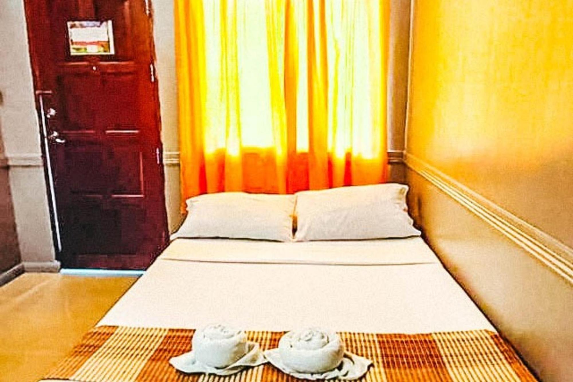 Mbg Travellers Inn Powered By Cocotel Пуэрто-Принцеса Номер фото