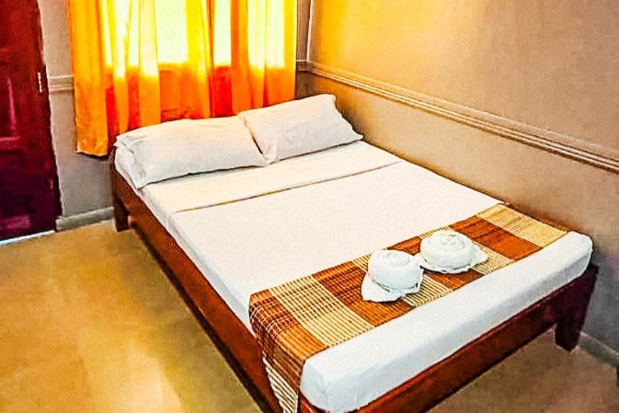 Mbg Travellers Inn Powered By Cocotel Пуэрто-Принцеса Номер фото