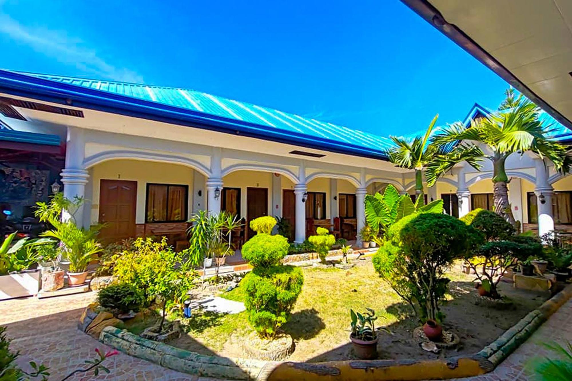 Mbg Travellers Inn Powered By Cocotel Пуэрто-Принцеса Экстерьер фото